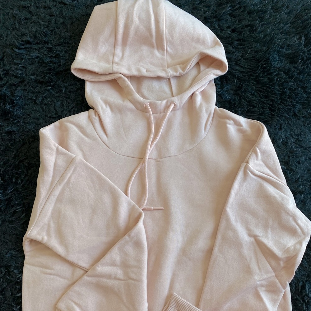 Brand new peach color  sweater